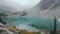 Men kayak on tranquil Moraine Lake, surrounded by majestic mountains generated by AI