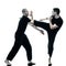 Men krav maga fighters fighting isolated