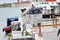 Men load garbage aboard a garbage boat in Venice