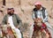 Men looks for tourists for camel ride.