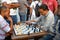 Men playing chess in Conde Street. Santo Domingo, Dominican Republic.