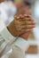 Men praying together at church wedding ceremony