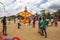 Men prepare to launch a large kite skywards on Negombo beach.