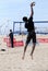 Men\'s beach volleyball jump serve