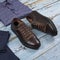 Men`s casual outfits for men clothing set with shoes, trousers, shirt on wooden background, Top view