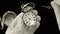 Men`s gloved hands hold a pocket watch and customize them. Black background. Sound