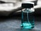 Men`s green perfume in beautiful bottle so close