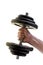 Men\'s hand holding a black dumbbell