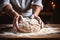Men\\\'s hands in flour on homemade rustic organic bread. Homemade baking