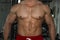 Men`s inflated chest close-up. Gym. Body-builder. Beautiful, swollen male body. Trainer, advertising, healthy lifestyle.