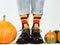 Men`s legs, fashionable shoes and colorful socks