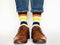 Men`s legs, trendy shoes and bright socks