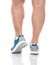 Men`s sports legs in sneakers.