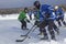 Men`s teams compete in a Pond Hockey Festival in Rangeley.