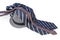 Men`s ties lying on the lightweight cotton fedora hat