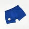 Men`s underwear, blue underpants and cotton flowers on white background flat lay top view copy space. Fashion blog, natural