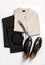 Men\\\'s wool beige sweater, black jeans, boots, leather belt. Set of comfortable casual winter or autumn clothes on a light