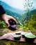 Men serving chinese tea in a traditional outdoor tea ceremony