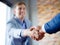 Men shaking hands. Confident businessman shaking hands with each other.
