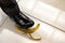 Men shoe stepping on banana peel