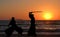 Men silhouettes practicing Aikido