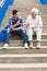 Men sitting on stairs