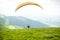 Men starting a paraglider flight