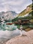 men on vacation in the Italian Dolomites, Beautiful lake in the italian alps, Lago di Braies