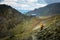 Men is walking on a road to Studlhutte shelter Grossglockner