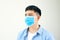 Men wear masks to prevent air pollution, White background, haze and PM 2.5 dust and smoke pollution in big cities