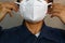 Men wearing surgical masks KN95 in the workplace to protection against