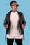 Men wearing white long sleeve t shirt and leather faux jacket isolated on background.