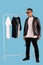 Men wearing white long sleeve t shirt and leather faux jacket isolated on background.