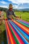 Men weaving in the peruvian Andes at Taquile Island on Puno Peru at janury 2th, 2008.