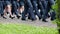 Men and women in military uniforms march across the parade ground on a cloudy summer day. Federal Service for the