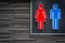 Men and women signs for restroom on modern stone wall background