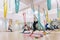 Men and women training yoga by hammocks for Anti-gravity air flying yoga. Wellness for man and woman lifestyle at yoga studio.
