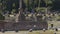 Men and women viewing stone ruins of ancient Roman Forum in Italy, slow motion