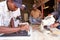 Men at work in a carpentry workshop, South Africa