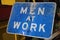 Men at Work Sign