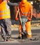 Men are working at the road construction