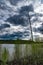 Menacing clouds gather above the lake  in Alberta