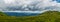 Menacing clouds over mountains panorama