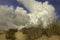 Menacing clouds over the pure sandunes at Sampieri beach in Sicily in a summer windy day