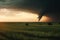 Menacing Tornado at Sunset over Open Plain