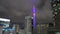 Menara Kuala Lumpur the TV tower lights up at night.