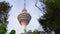 The Menara tower shot from the hanging suspension bridge in the Eco Park in the Kuala Lumpur city