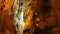 MENCILIS CAVE, SAFRANBOLU, TURKEY - APRIL 2015: tourist group travel stalactite