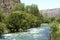 mendoza argentina fast and narrow canyon of the atuel river fast in its waters for sports with erosion and sause trees and