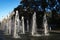 Mendoza Argentina Water fountain in the Plaza de la Independencia in the background a futuristic building of the city